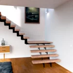 Escalera moderna en pletina de hierro color negro vista frontal