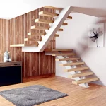 Escalera moderna en tubo de gran dimensión de hierro color blanco vista central