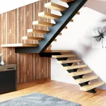 Escalera moderna en tubo de gran dimensión de hierro color negro vista central