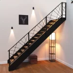 Barandilla para escalera color negro vista lateral lejos