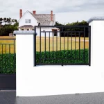 valla decorativa en tubos de hierro color negro