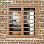 Reja abatible para ventana de color marrón, modelo Anelf de Cerrajería Metalhive